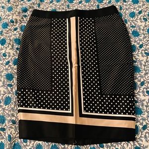 Beautiful Ann Taylor black dotted skirt size 6P with tag.